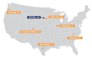 Map showing seven offices across the country. Portland, Colorado Springs, San Antonio, Mitchell SD, Sioux Falls, Springfield IL, and Charlotte.